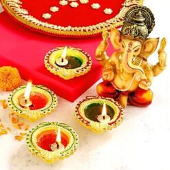 Ganesha Idol with Colourfull Diyas