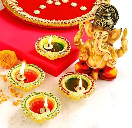 Ganesha Idol with Colourfull Diyas