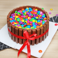 Kitkat gems cake with red roses