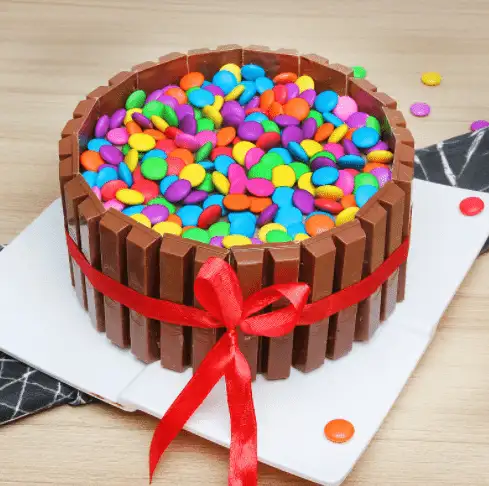 Kitkat gems cake with red roses - Image 2