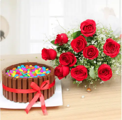 Kitkat gems cake with red roses