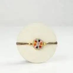 p navratna rakhi with rasmalai cake 261651 1
