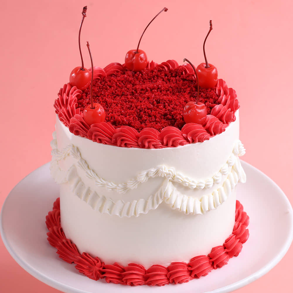 Close view of cherries red velvet cake