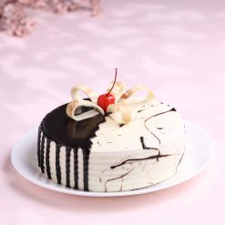 Side view of chocolate vanilla cream cake