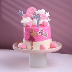 Pink Barbie birthday theme cake side view