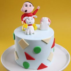 Close view of Shinchan and Shiro theme cake