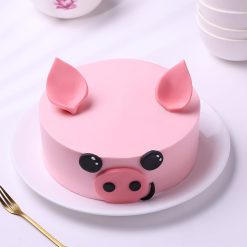 Pink pig face designer birthday cake