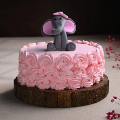 Pink rosette elephant theme cake