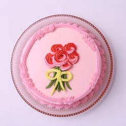 Pink rose bow cake side view