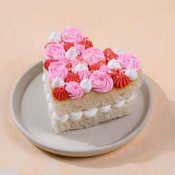 Blushing heart bento cake with pink and coral swirls