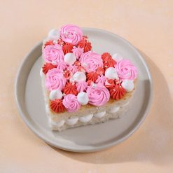 Top view of blushing heart bento cake