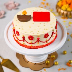 Diwali diya cake with red floral decoration