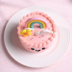 Rainbow smiles bento cake with colourful rainbow and clouds