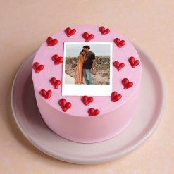 Pink bento photo cake with red heart decorations